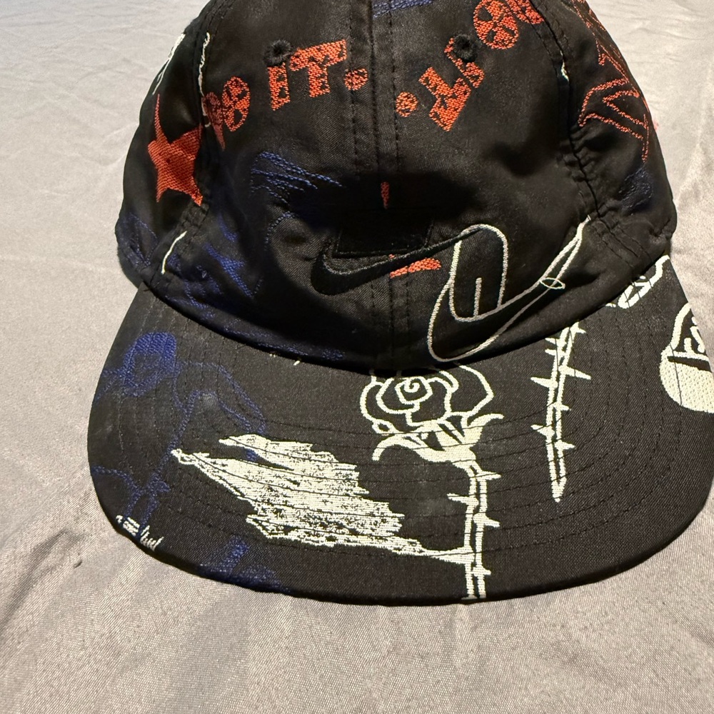 Nike Black Graphic Cap with Red and White Accents
